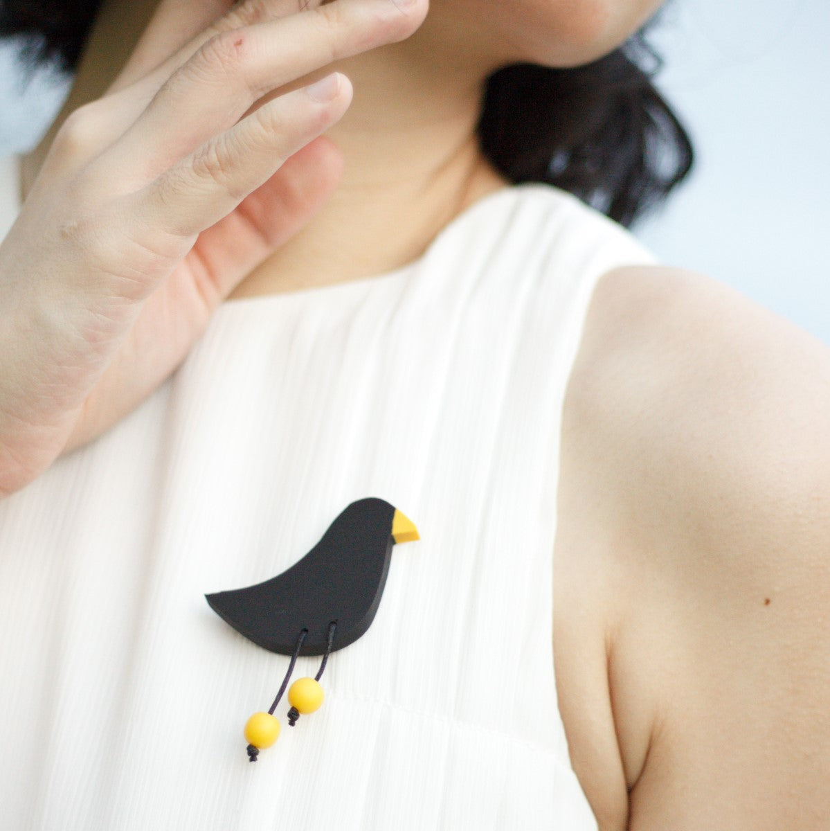 Myna brooch